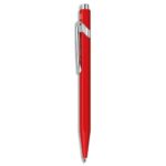 CARAN D'ACHE Stylo bille 849 CLASSIC rétractable en aluminium. Corps hexagonal rouge, encre bleue